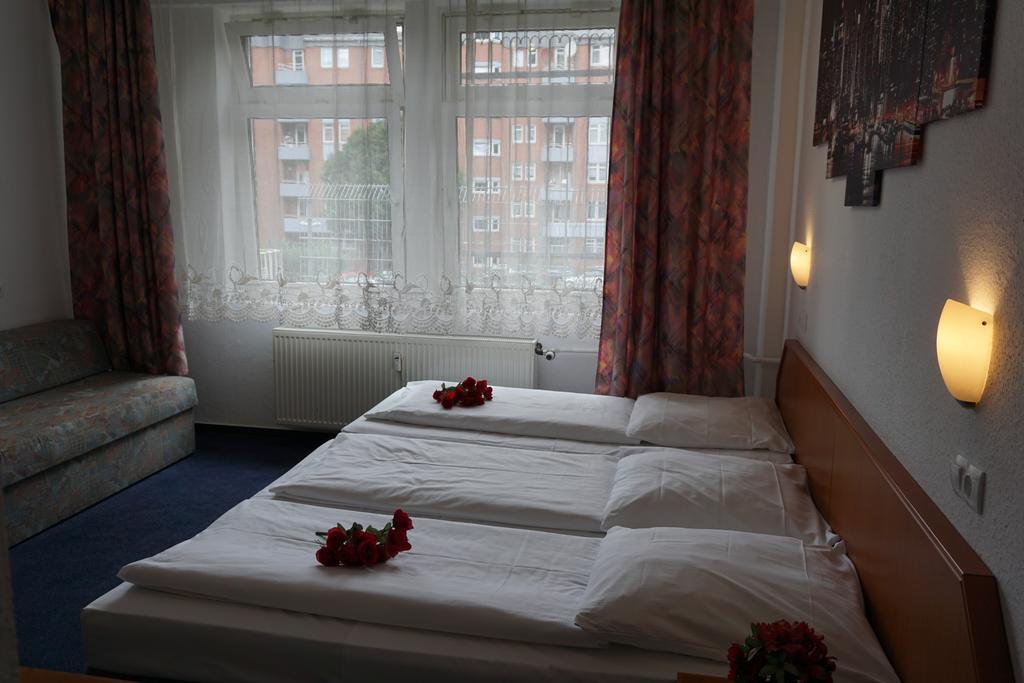 Itm Hotel Oase Гамбург Номер фото