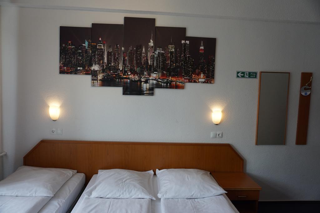 Itm Hotel Oase Гамбург Номер фото