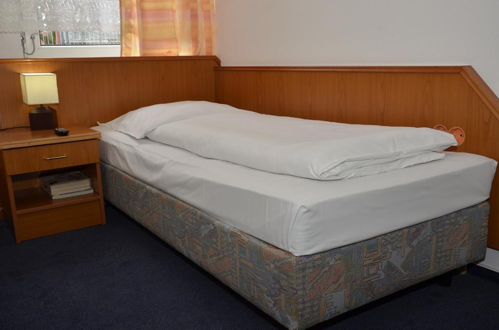 Itm Hotel Oase Гамбург Номер фото